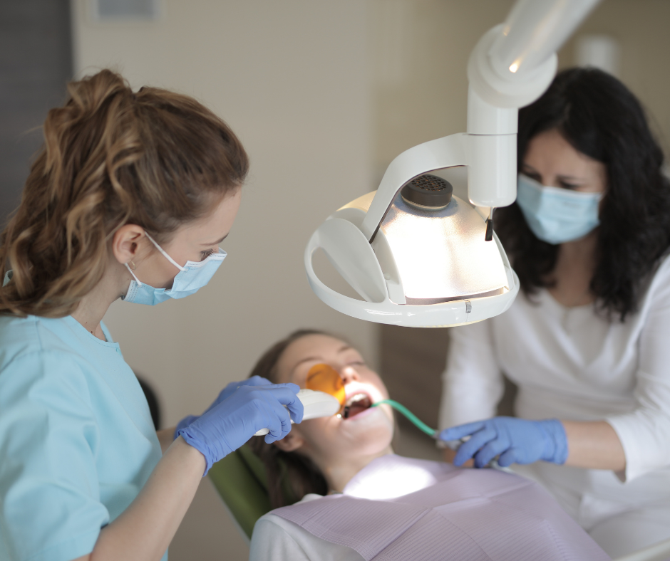 Dentist providing restorative dental treatment